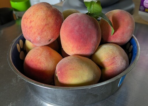 Peaches in a bowl.